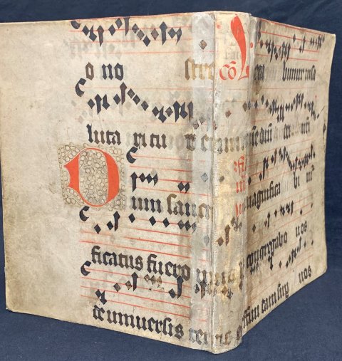 Probably executed by the first owner, a College of Jesuit monks, in 1666, this volume of astrological charts is covered in an old sheet of music on vellum which may have been discarded from the scriptorium.