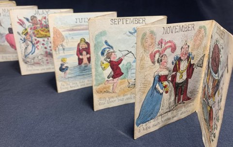 For each month there is a two-line poem and a drawing, folded into a delicate paper concertina.